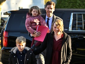 David Eby arrives with his family to be sworn in as B.C.'s premier at the Musqueam Community Centre in Vancouver, on Friday, Nov. 18, 2022.