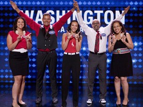 Derek Washington (second from left) and his family compete on Family Feud Canada.