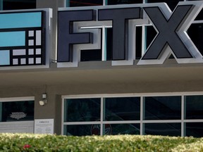 The logo of FTX is seen at the entrance of the FTX Arena in Miami, Florida, U.S., November 12, 2022. REUTERS/Marco Bello