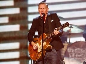Singer Bryan Adams performs during the closing ceremony for the Invictus Games in Toronto on Sept. 30, 2017.