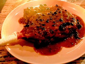 A Fraser Valley pork chop with a fermented black bean butter sauce at Hanai restaurant.