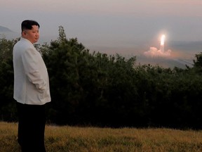 North Korea's leader Kim Jong Un oversees a missile launch at an undisclosed location in North Korea, in this undated photo released on October 10, 2022 by North Korea's Korean Central News Agency (KCNA).