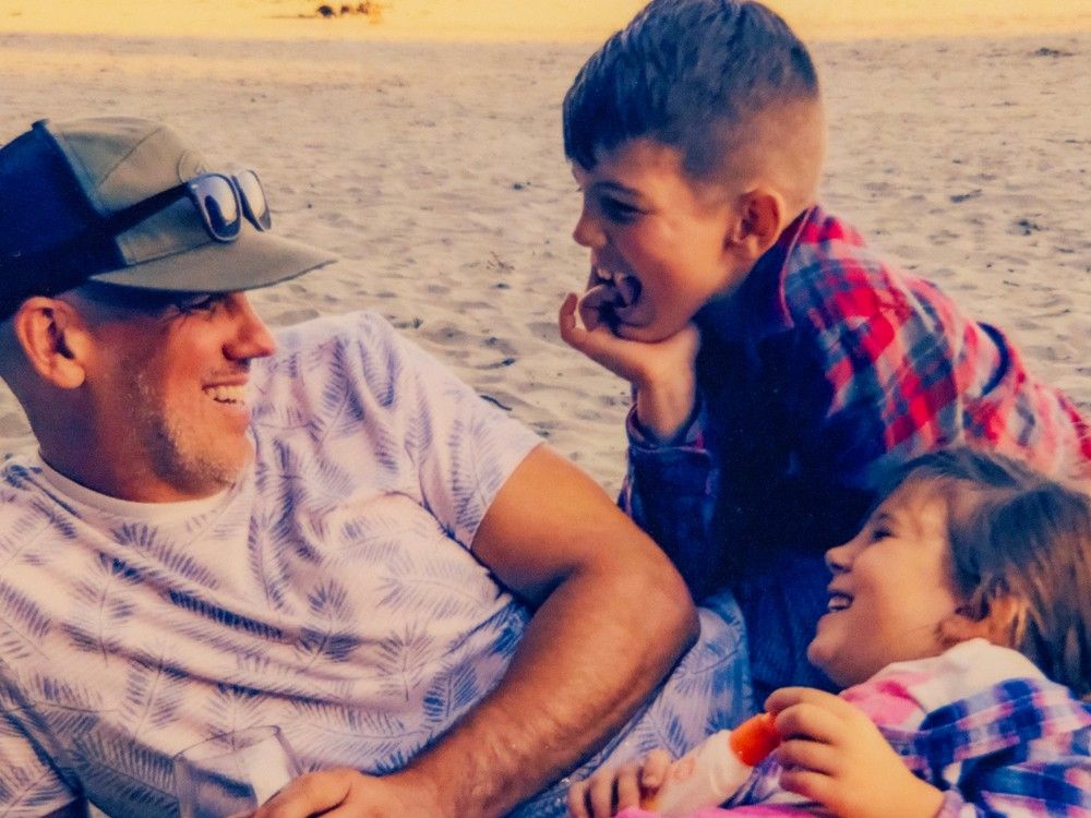  family photo of greg gowe with his children, micah and maleah, before his als diagnosis.