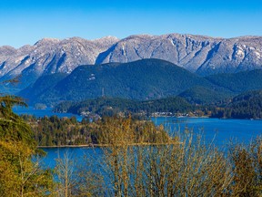Snow-capped mountains in Deep Cove as seen from Burnaby.
