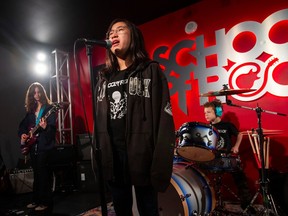 The School of Rock Vancouver, a performance-based music education school, holds a grand opening event on Nov. 9. Pictured is The School of Rock house band performing during the opening.