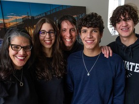 The Weiss family, (from left) Lori-Ann, Nadia, Joshua, Noah and Elijah, survived a bad accident during B.C.'s 2021 atmospheric river storm and floods.
