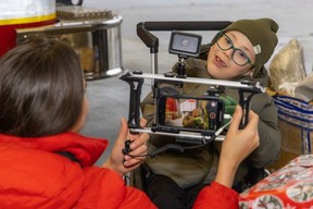 Mark Motorenko smiles for the camera on Saturday as he was reunited with some vital medical equipment that his family had been forced to leave behind when they fled Ukraine in late February.