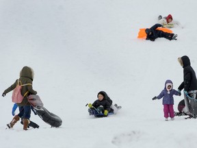 Children enjoy a snow day at Kensington Park in January 2020.