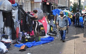 Scenes from the Downtown Eastside (DTES) as the City complied with the Vancouver Fire Department’s order to clear tents from the sidewalks for health and safety reasons in Vancouver, BC., on August 9, 2022.