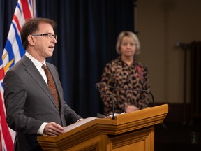 Adrian Dix, Minister of Health, and Dr. Bonnie Henry, provincial health officer, provide an update on the respiratory illness season in British Columbia, on November 16, 2022.