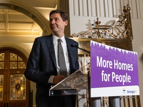 Premier David Eby introduces new laws on housing at the legislature on Monday.