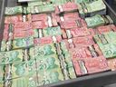 Handout photo of money seized by police during investigation called Project Collector. This was a three-year financial crime investigation conducted jointly between ALERT Calgary’s financial crime team and RCMP Federal Serious and Organized Crime (FSOC). The investigation began in Calgary and led to the dismantling of a nation-wide criminal organization involvingmoney laundering between Ontario, Alberta, and British Columbia.