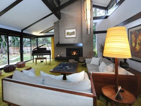 The living room from a house designed by Ron Thom in 1960. Note the shag carpet, floor to ceiling windows, and unique angled ceiling.