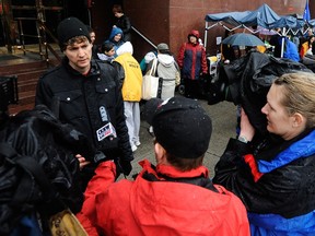 David Eby, then a lawyer with the  B.C. Civil Liberties Association, speaks to reporters in Vancouver's Downtown Eastside in 2009.