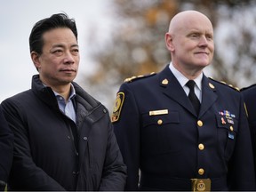 Vancouver Mayor Ken Sim, left, and Vancouver Police Chief Adam Palmer.
