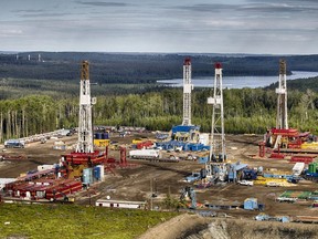 Rigs on a drilling pad the Montney basin in northeastern B,C, and northwestern Alberta.
