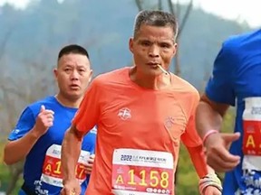 "Uncle Chen" is pictured while smoking and running a marathon