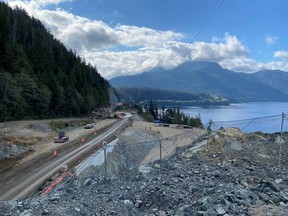 Grading, slope stabilization and cantilever girder/deck panel placement work at Kennedy Hill, the week of Sept 19, 2022.