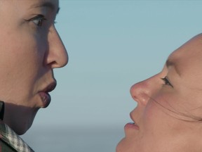 Tanya Tagaq (r) and Laakkuluk Williamson Bathory are seen here, in a scene from the documentary film Ever Deadly, doing traditional throat singing. The form involves two women singing closely together using a "call and response" technique. Photo: Courtesy of NFB (multiuse)