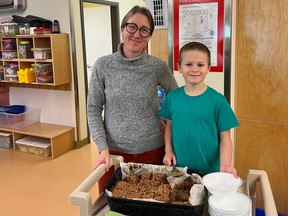 Giscome Elementary vice principal Sarah Heppner and one of her helpers about to serve baked oatmeal for breakfast. Photo: Jaxon Bamber.
