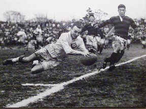 Copy of a photograph of Coun. George Puil playing rugby in his younger days. The photo was on the wall of his city hall office.