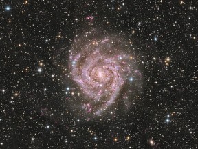 Photograph of IC342, also known as the Hidden Galaxy because it lies behind the dust of our Milky Way equator and is hard to see.