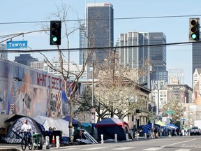 A homeless encampment lines a street in Skid Row on December 14, 2022 in Los Angeles.