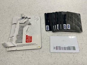 Visa gift cards that have been tampered with.