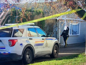 Homicide investigators at the scene of a murder in Chilliwack on Wednesday, Dec. 14.