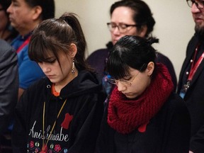 Kera Harris, right, and Cambria Harris speak during a press conference at the Assembly of First Nations Special Chiefs Assembly in Ottawa, on Thursday, Dec. 8, 2022. First Nations leaders in Manitoba are calling for the resignation of Winnipeg's police chief after the force decided to not search a landfill for the remains of two Indigenous women.