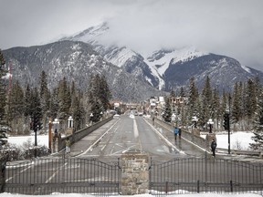 The empty streets of Banff are seen as Parks Canada is restricting vehicles in the national parks and national historic sites in Banff, Alta., Tuesday, March 24, 2020. A special avalanche warning is in place until Monday throughout most of the Columbia Mountains in British Columbia as well as the Northern Rockies in B.C. and Alberta.