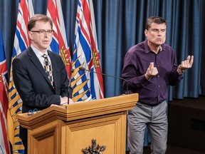 Nigel Howard, right, an American Sign Language teacher and interpreter, became BC's best-known interpreter when he was interpreting for Health Secretary Adrian Dix (pictured) and Dr. Bonnie Henry translated.