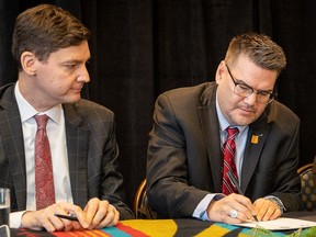 Then B.C. attorney-general David Eby and Doug White, then chair of the B.C. First Nations Justice Council, sign a strategic agreement. Today, Eby is premier and White one of his top advisers.