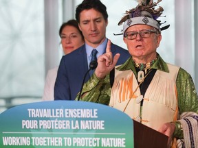 Elder Ka'nahsohon Kevin Deer performs a ceremony prior to Canada's Prime Minister Justin Trudeau making an announcement supporting Indigenous-led conservation COP15 U.N. Biodiversity summit in Montreal, Quebec, Canada December 7, 2022. REUTERS/Christinne Muschi