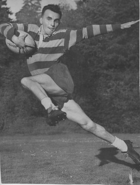Undated photograph of George Puil playing rugby.