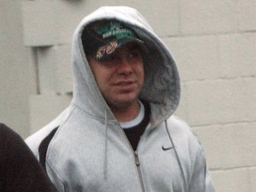A police surveillance photo from 2008 of Matt Johnston outside an IHOP restaurant.