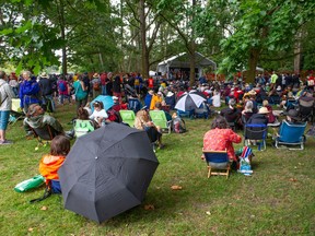 Crowds take part in the 45th annual Vancouver Folk Festival at Jericho Beach in July.