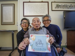 Captain Ting Cheng Wu, who turned 100 years old on Feb. 22, 2022, with daughter Yee Ping Wu and son-in-law Philip Lui.