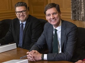 Doug White, left, adviser on Indigenous issues to Premier David Eby (right).