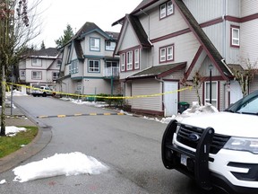 Surrey RCMP on scene Dec. 8, 2022, after a stabbing in the Newton area that left one female dead.