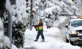 Street cleaning scenes on Lonsdale Ave. overpass on Dec. 20, 2022.