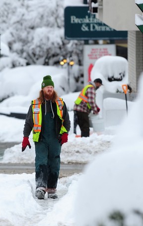 Street cleaning scenes on Lonsdale Ave. overpass on Dec. 20, 2022.