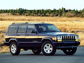 Stock photo of a mid-2000s Jeep Cherokee.