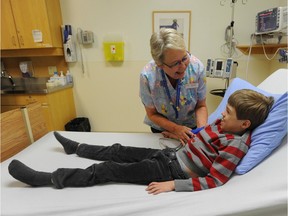 A child is checked over at B.C. Children's Hospital, one of the operations that comes under B.C.'s Provincial Health Services Authority.
