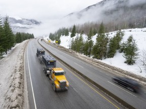 Vehicles are seen as they drive along the Coquihalla Highway Wednesday, January 19, 2022.&ampnbsp;Environment Canada is warning of heavy snow on the Coquihalla Highway and bitterly cold temperatures in British Columbia's northwest as arctic air sweeps across the province. THE&ampnbsp;CANADIAN PRESS/Jonathan Hayward