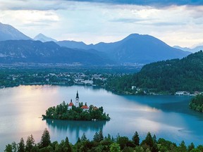 The fairy-tale-like view of Lake Bled and the 17th century Church of the Assumption of Mary.