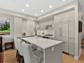 Quartz countertops and top-of-the-line stainless-steel appliances in the kitchen at 236 West 18th Street, in North Vancouver.