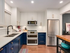 Sold (Bought): Kitchen shines with on-trend cabinets finished in a deep blue hue