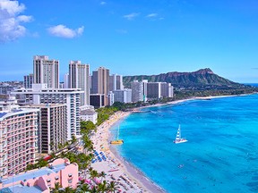 Panoramic view of Hawaii's Waikiki Beach with Diamond Head in the background.