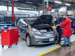 A student in the battery electric vehicle technology and service course gets instruction from a BCIT instructor. Job trainers, government and employers must be in close collaboration to identify areas of need and build the talent that supports in-demand jobs, says BCIT interim president Paul McCullough.